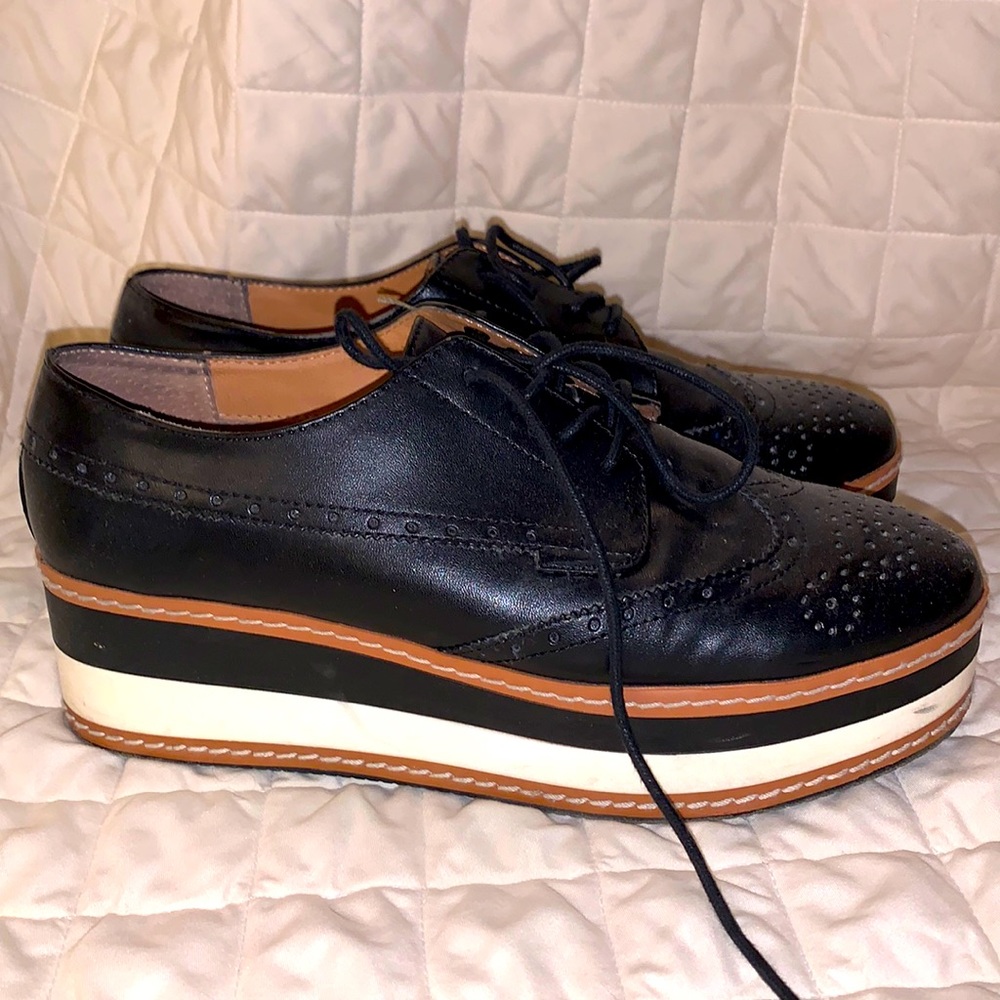 Black Steve Madden platform loafers